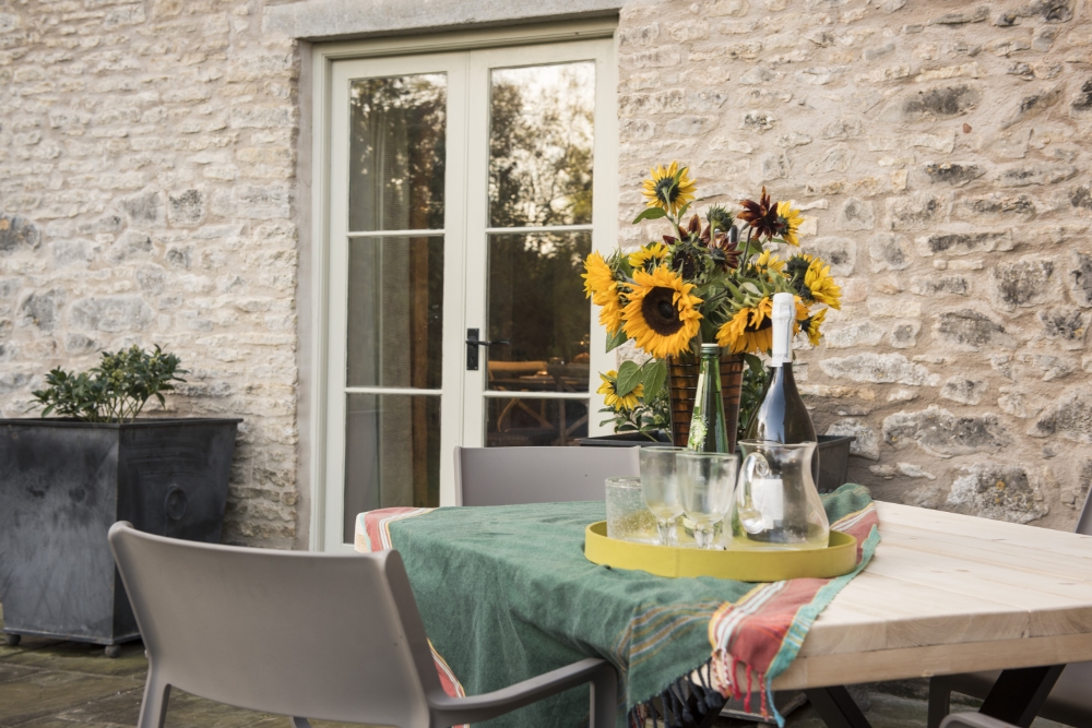Image of the outside dining area in Deerleap at Lilycombe Farm